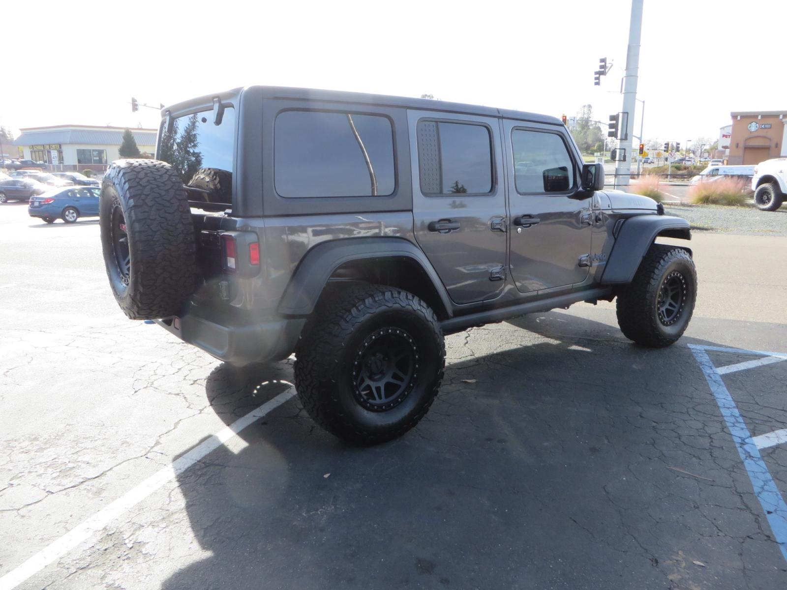 2023 CHARCOAL /black Jeep Wrangler Unlimited Willys 4XE (1C4JJXN68PW) with an 2.0L L4 DOHC 16V HYBRID engine, 8A transmission, located at 2630 Grass Valley Highway, Auburn, CA, 95603, (530) 508-5100, 38.937893, -121.095482 - 3" Zone Offroad lift kit, Fox Adventure series shocks, 17" Method Race wheels, 37" BFG KO2 tires, and a Teraflex spare tire carrier. - Photo #4